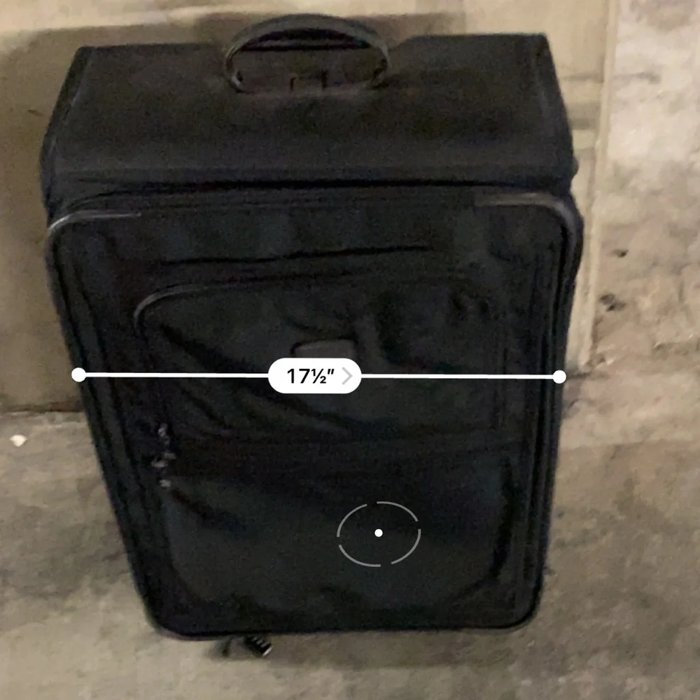 TUMI Check On Suitcase